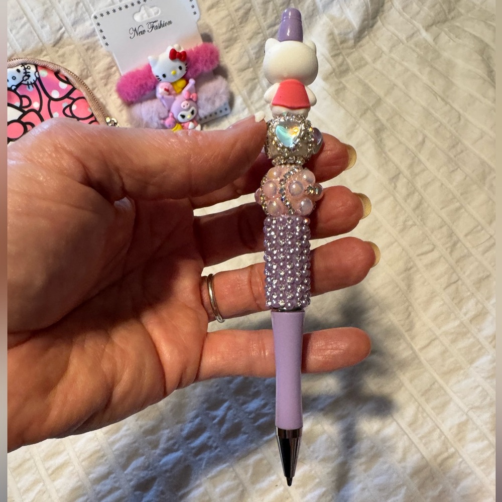 Sanrio-Hello Kitty Bundle With Pink Pouch, 2 Hair Ties, & Pen 3-Piece Set - Picture 9 of 9